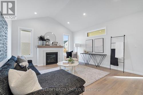 8 Hartland Circle, St. Thomas, ON - Indoor Photo Showing Living Room With Fireplace
