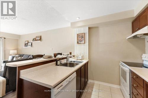 204 - 132 Aspen Springs Drive, Clarington (Bowmanville), ON - Indoor Photo Showing Kitchen With Double Sink