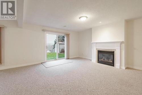 1587 Scollard Crescent, Peterborough (Ashburnham Ward 4), ON - Indoor Photo Showing Living Room With Fireplace