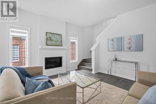 59 Jazzberry Road, Brampton, ON - Indoor Photo Showing Living Room With Fireplace
