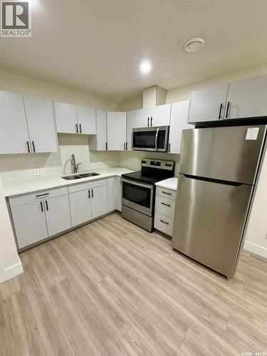 3214 Green Brook Road, Regina, SK - Indoor Photo Showing Kitchen With Stainless Steel Kitchen With Double Sink