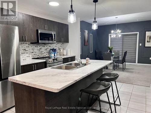 74 Alaskan Heights, Barrie, ON - Indoor Photo Showing Kitchen With Double Sink With Upgraded Kitchen