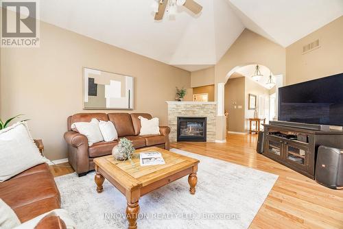 25 Kyle Avenue, Ottawa, ON - Indoor Photo Showing Living Room With Fireplace