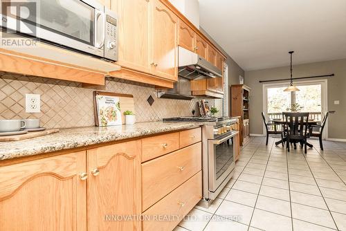 Commercial grade hood fan - 25 Kyle Avenue, Ottawa, ON - Indoor Photo Showing Kitchen