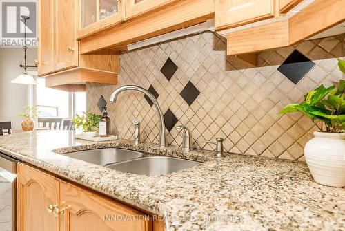 chic backsplash, undermount sink - 25 Kyle Avenue, Ottawa, ON - Indoor Photo Showing Kitchen With Double Sink
