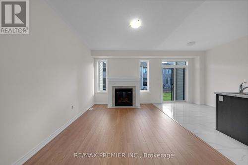 16 Prudhoe Terrace, Barrie, ON - Indoor Photo Showing Living Room With Fireplace