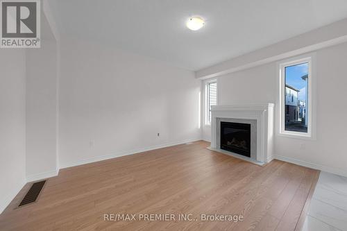 16 Prudhoe Terrace, Barrie, ON - Indoor Photo Showing Living Room With Fireplace