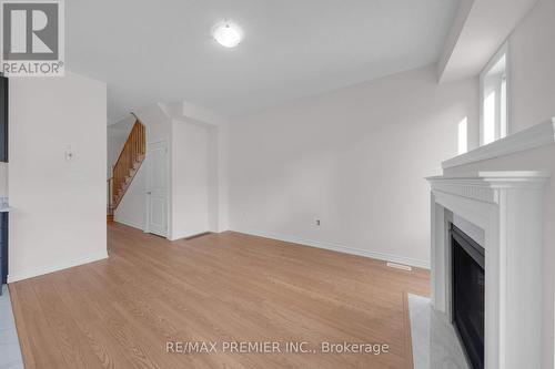 16 Prudhoe Terrace, Barrie, ON - Indoor Photo Showing Other Room With Fireplace