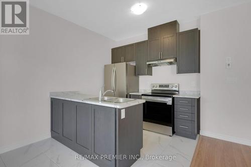 16 Prudhoe Terrace, Barrie, ON - Indoor Photo Showing Kitchen With Stainless Steel Kitchen With Double Sink