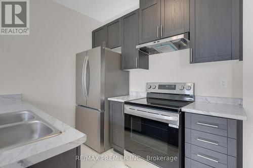 16 Prudhoe Terrace, Barrie, ON - Indoor Photo Showing Kitchen With Stainless Steel Kitchen With Double Sink