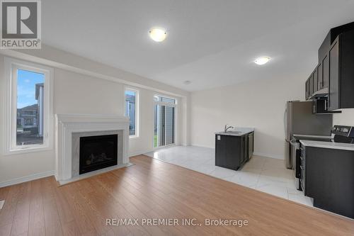 16 Prudhoe Terrace, Barrie, ON - Indoor With Fireplace