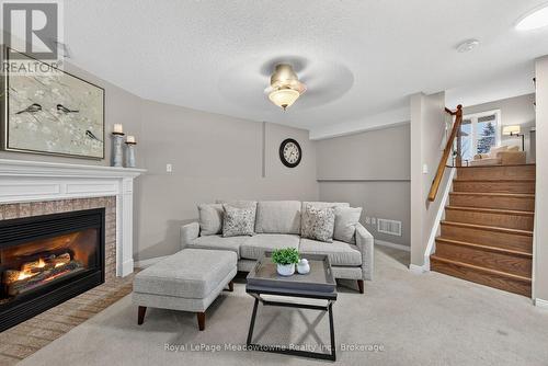 1 Draper Crescent, Barrie (Painswick North), ON - Indoor Photo Showing Living Room With Fireplace