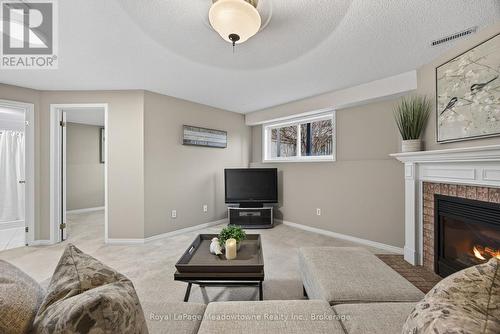 1 Draper Crescent, Barrie (Painswick North), ON - Indoor Photo Showing Living Room With Fireplace