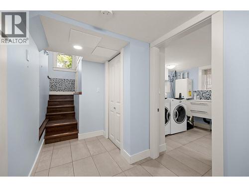 Downstairs - 12313 Kalavista Drive, Coldstream, BC - Indoor Photo Showing Laundry Room
