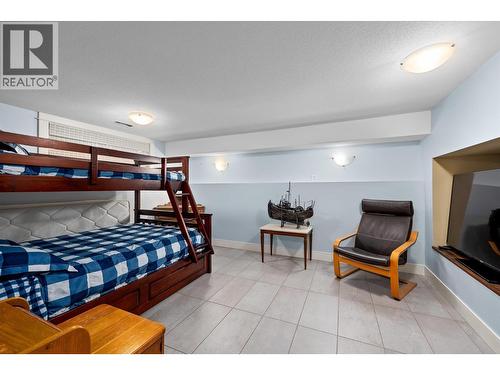 Downstairs bedroom or rec room, has a window. - 12313 Kalavista Drive, Coldstream, BC - Indoor Photo Showing Bedroom