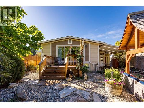 Stairs down from the primary bedroom deck. - 12313 Kalavista Drive, Coldstream, BC - Outdoor
