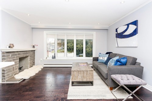 419 Brownfield Gardens, Toronto, ON - Indoor Photo Showing Living Room With Fireplace