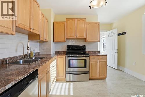 1214 B Avenue N, Saskatoon, SK - Indoor Photo Showing Kitchen With Double Sink