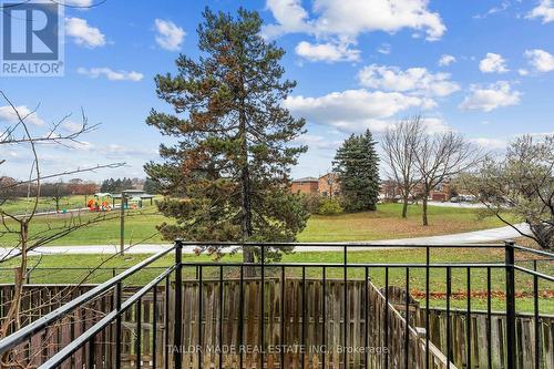 View of fenced yard from balcony - 38 Collins Crescent, Brampton, ON - Outdoor With View