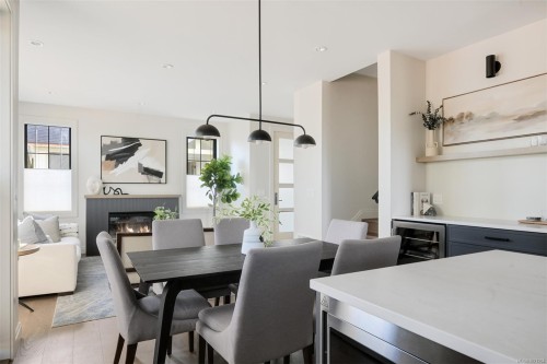 4-5032 Wesley Rd, Saanich, BC - Indoor Photo Showing Dining Room With Fireplace