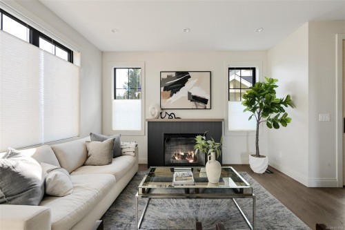 4-5032 Wesley Rd, Saanich, BC - Indoor Photo Showing Living Room With Fireplace