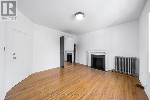 Main - 46 Concord Avenue, Toronto, ON - Indoor With Fireplace