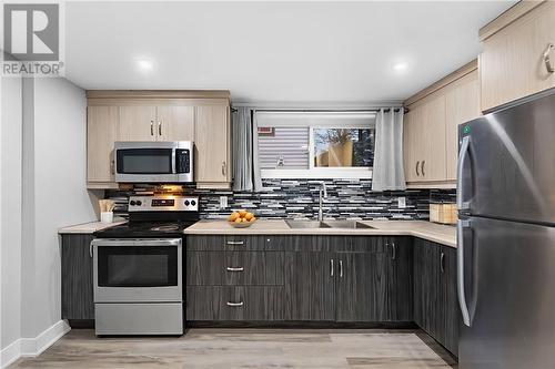 539 Howey, Sudbury, ON - Indoor Photo Showing Kitchen With Double Sink