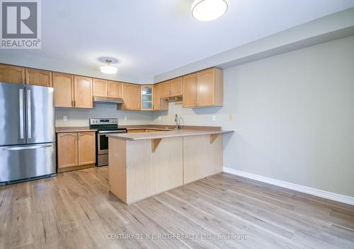 Open concept kitchen with breakfast bar! - 194 Sundew Drive, Barrie, ON - Indoor Photo Showing Kitchen