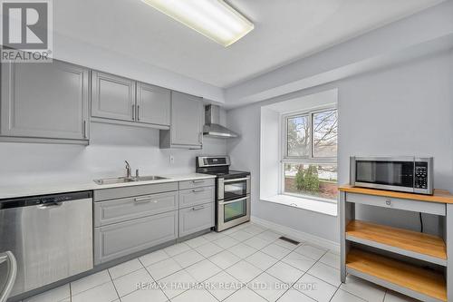 98 - 4662 Kingston Road, Toronto, ON - Indoor Photo Showing Kitchen With Double Sink