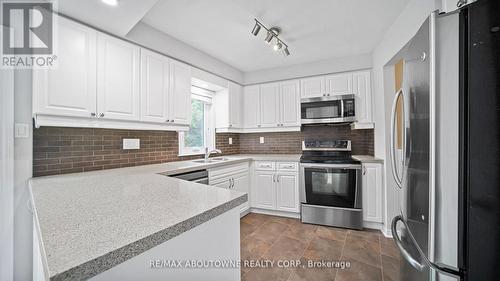 1228 Cornerbrook Place, Mississauga, ON - Indoor Photo Showing Kitchen With Double Sink