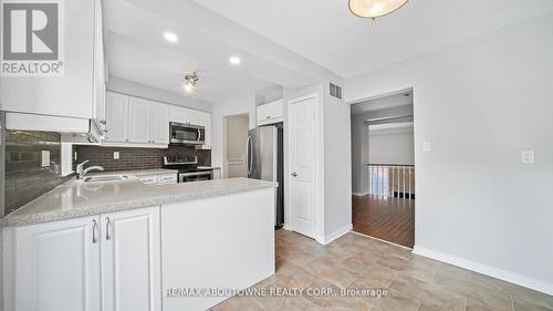1228 Cornerbrook Place, Mississauga, ON - Indoor Photo Showing Kitchen With Double Sink