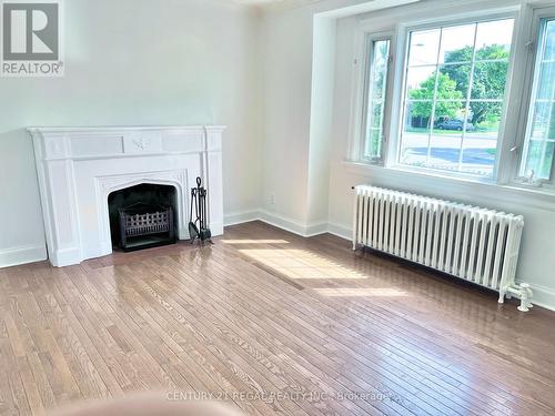 Living Room - 493 Plains Road, Toronto, ON - Indoor With Fireplace