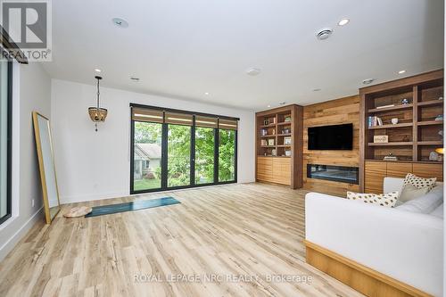 Wellness room offers a spacious & versatile space - 10 Pawling Street, St. Catharines (Port Dalhousie), ON - Indoor With Fireplace