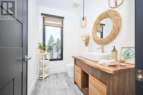 Modern yet earthy 2pc powder room - 10 Pawling Street, St. Catharines (Port Dalhousie), ON - Indoor Photo Showing Bathroom