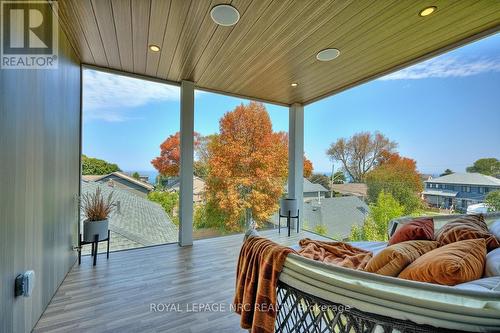 3rd level private glass-enclosed terrace - 10 Pawling Street, St. Catharines (Port Dalhousie), ON - Outdoor With Deck Patio Veranda With Exterior