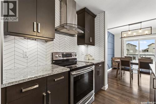 5669 Glide Crescent, Regina, SK - Indoor Photo Showing Kitchen With Upgraded Kitchen
