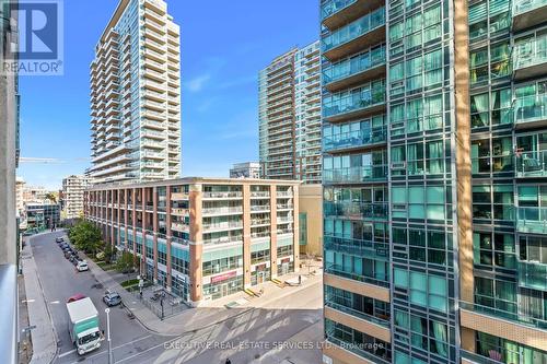 605 - 150 East Liberty Street, Toronto, ON - Outdoor With Balcony With Facade