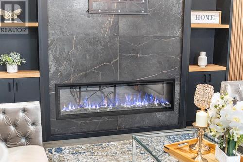 67 Eberly Woods Drive, Caledon, ON - Indoor Photo Showing Living Room With Fireplace