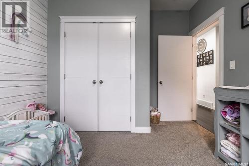 712 Maple Court, Warman, SK - Indoor Photo Showing Bedroom