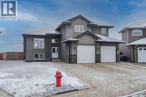 712 Maple Court, Warman, SK - Outdoor With Facade