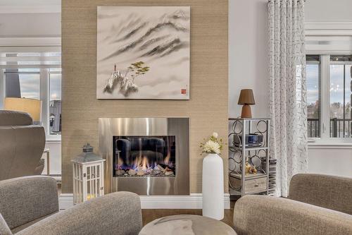 Living room - 605-7720 Rue Du Daim, Québec (Charlesbourg), QC - Indoor Photo Showing Other Room With Fireplace