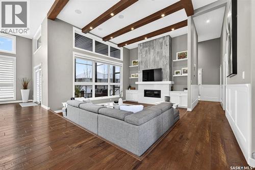 3406 Green Brook Road, Regina, SK - Indoor Photo Showing Living Room With Fireplace