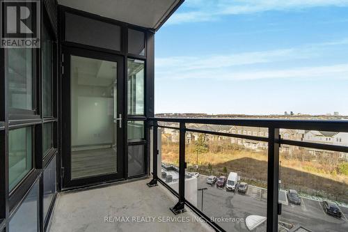 628 - 395 Dundas Street W, Oakville, ON - Outdoor With Balcony With Exterior