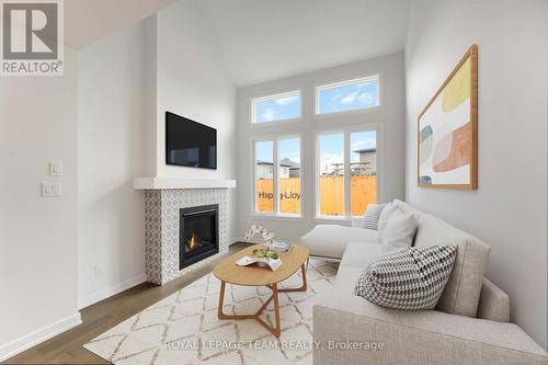 This image is virtually staged. - 91 Gartersnake Way, Ottawa, ON - Indoor Photo Showing Living Room With Fireplace