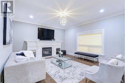 16 Fallgate Drive, Brampton, ON - Indoor Photo Showing Living Room With Fireplace