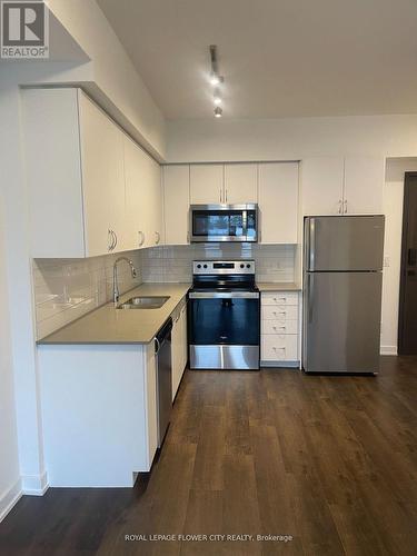 211 - 56 Lakeside Terrace, Barrie, ON - Indoor Photo Showing Kitchen With Stainless Steel Kitchen