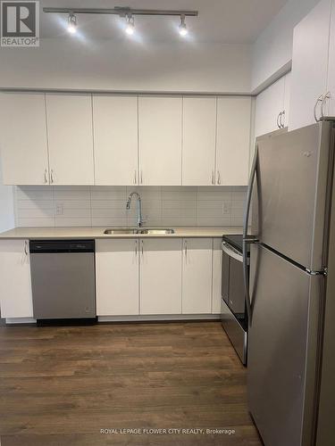211 - 56 Lakeside Terrace, Barrie, ON - Indoor Photo Showing Kitchen With Stainless Steel Kitchen