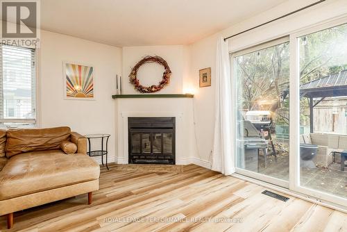 Wood burning fireplace - 78 Bujold Court, Ottawa, ON - Indoor Photo Showing Living Room With Fireplace