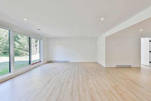 Basement - 1504 Ch. De L'Armoise, Piedmont, QC - Indoor Photo Showing Other Room