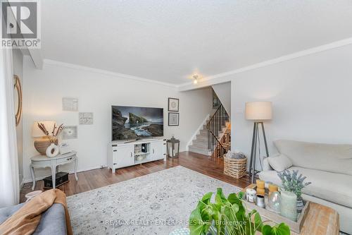 110 - 371 Bronte Street S, Milton, ON - Indoor Photo Showing Living Room